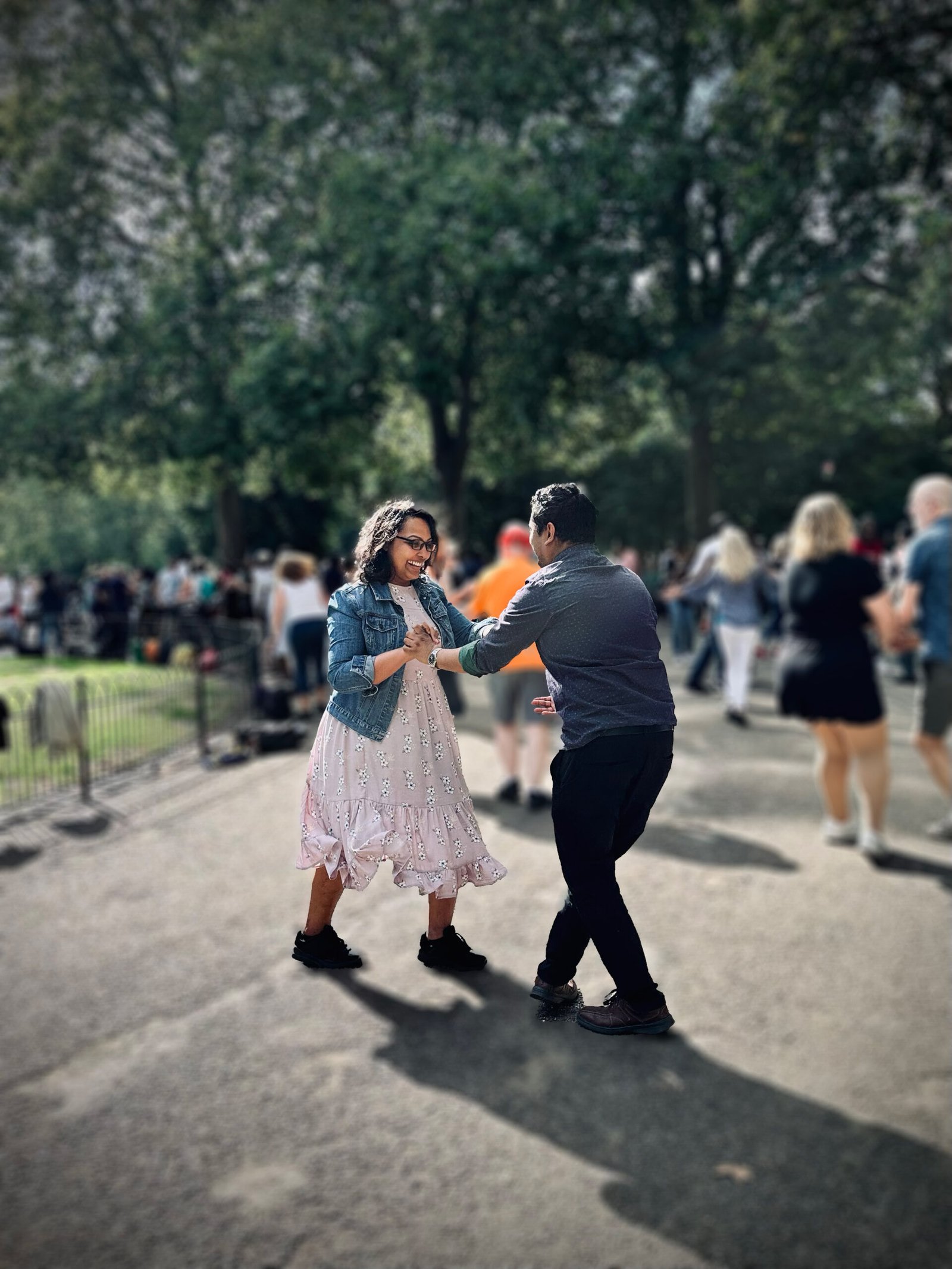 Couple dancing candidly at a park event — MZ Photographer Event Photography