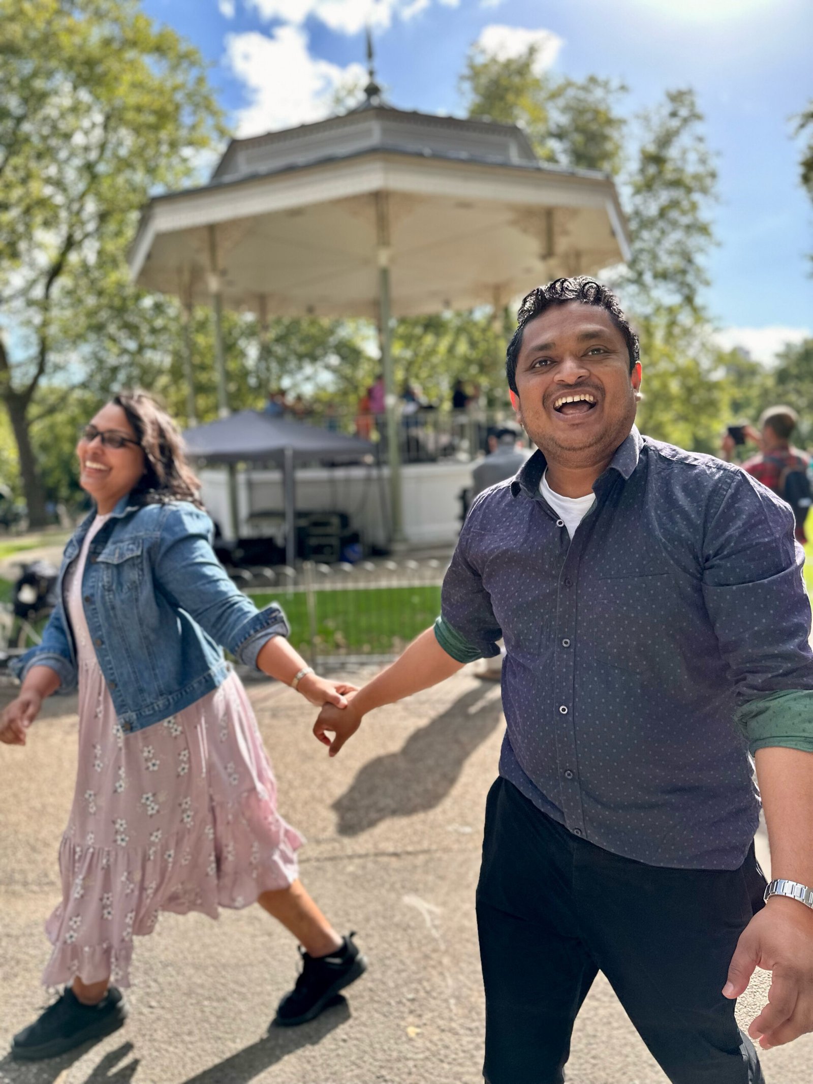 Couple walking hand-in-hand, laughing — MZ Photographer Event Photography