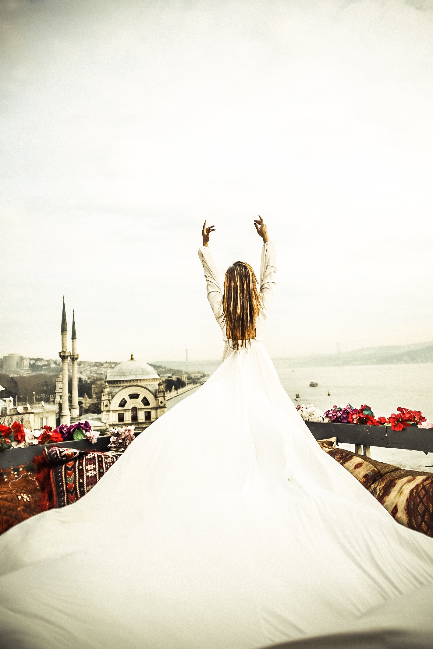 Bride with arms raised overlooking the city — MZ Photographer wedding photography